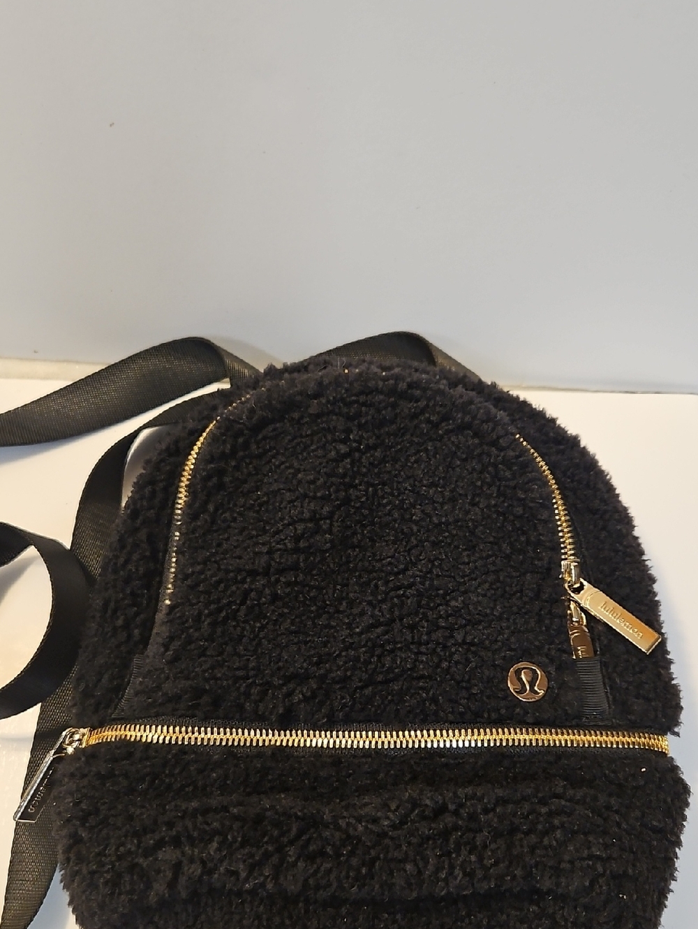 lululemon  Black Mini Fleece Backpack with Gold Hardware